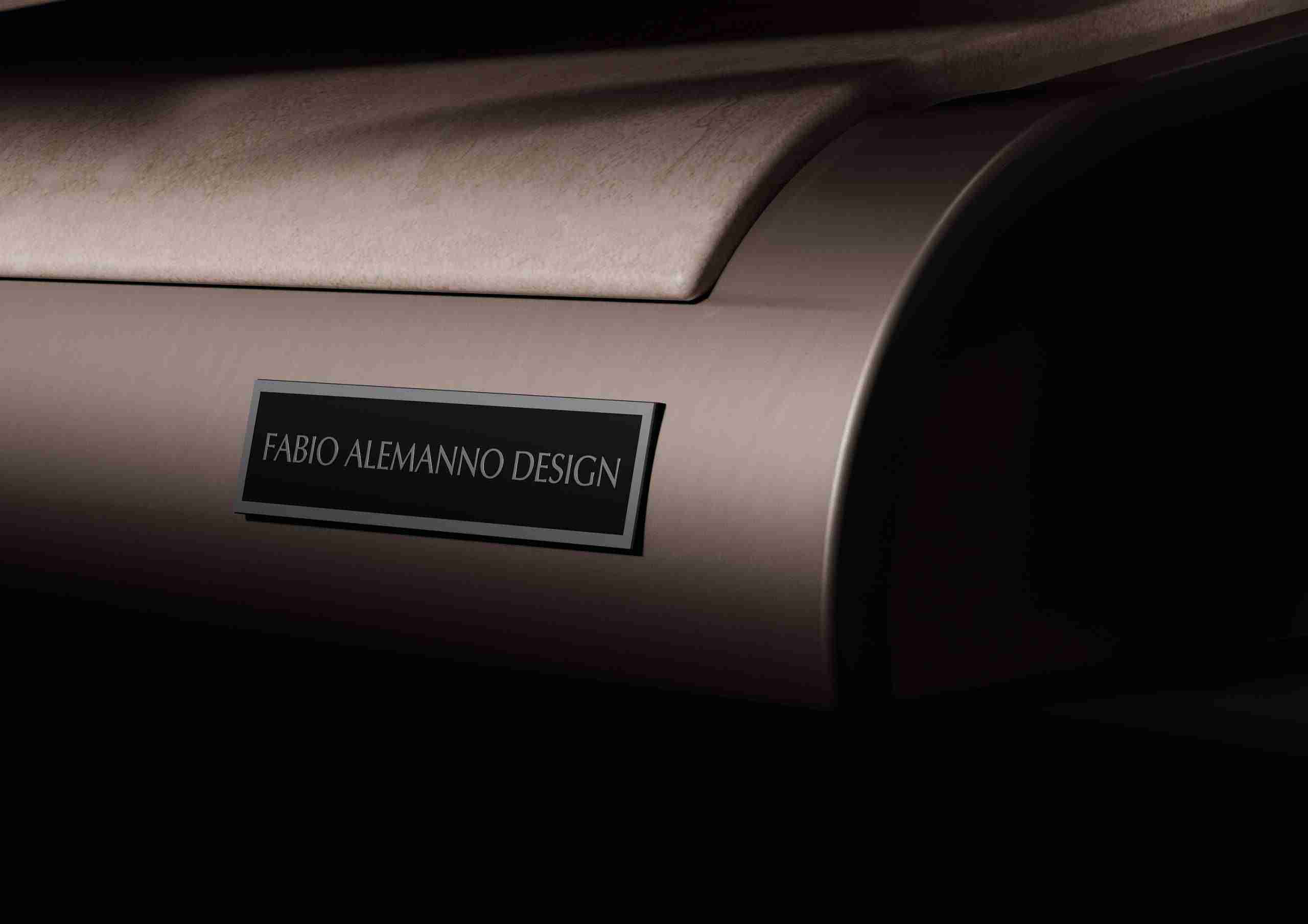 Diva Basico Plaque Detail — Engraved Fabio Alemanno Design Logo On A Heated Marble Spa Lounger; Italian Craftsmanship.