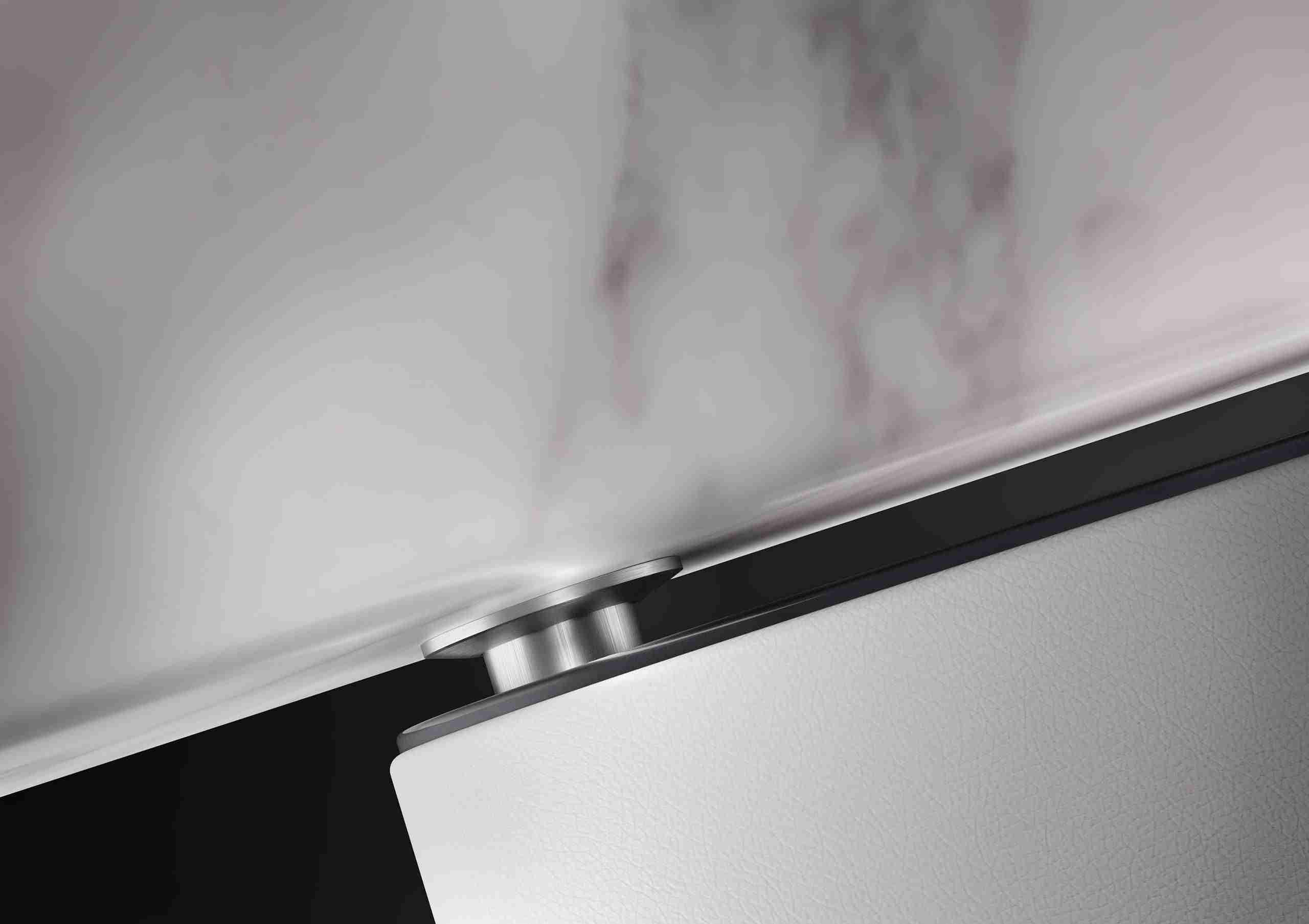 Detailed View Of The Cleopatra Moderno Heated Lounger Armrest Attachment, Combining Marble Elegance With Durable Stainless Steel Engineering. A Luxury Spa Furniture Piece By Fabio Alemanno Design, Crafted For Strength And Refinement.