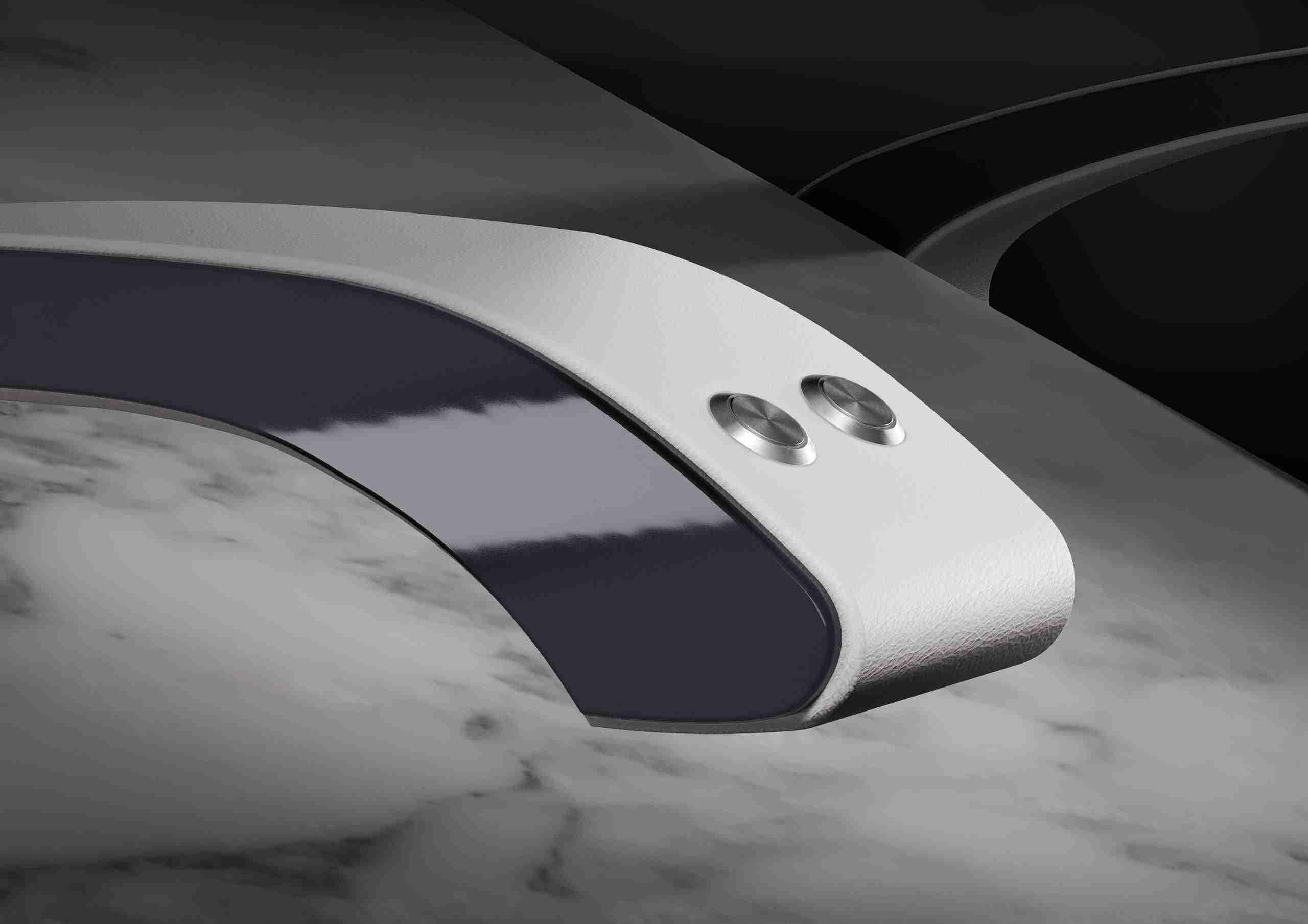 Close-Up Of Cleopatra Moderno Heated Lounger Armrest With Integrated Buttons. A Refined Luxury Spa Chair Designed By Fabio Alemanno, Combining Marble Elegance With Advanced Ergonomic And Heating Technology.