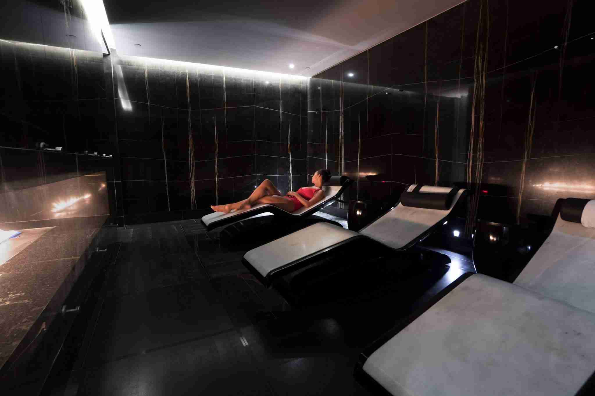 Espa Life At Corinthia — Relaxation Area Featuring Cleopatra Heated Marble Loungers.
