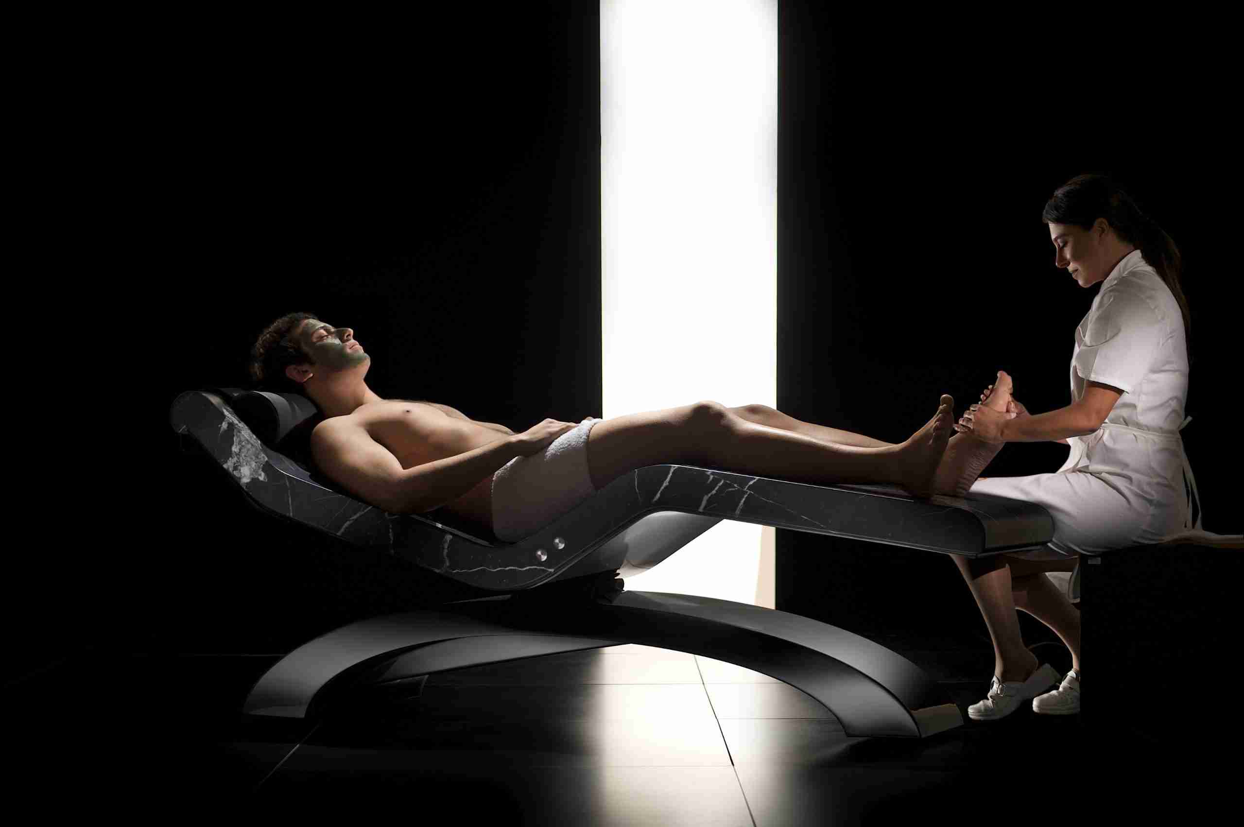 Reflexology Treatment On A Cleopatra Heated Marble Lounger.