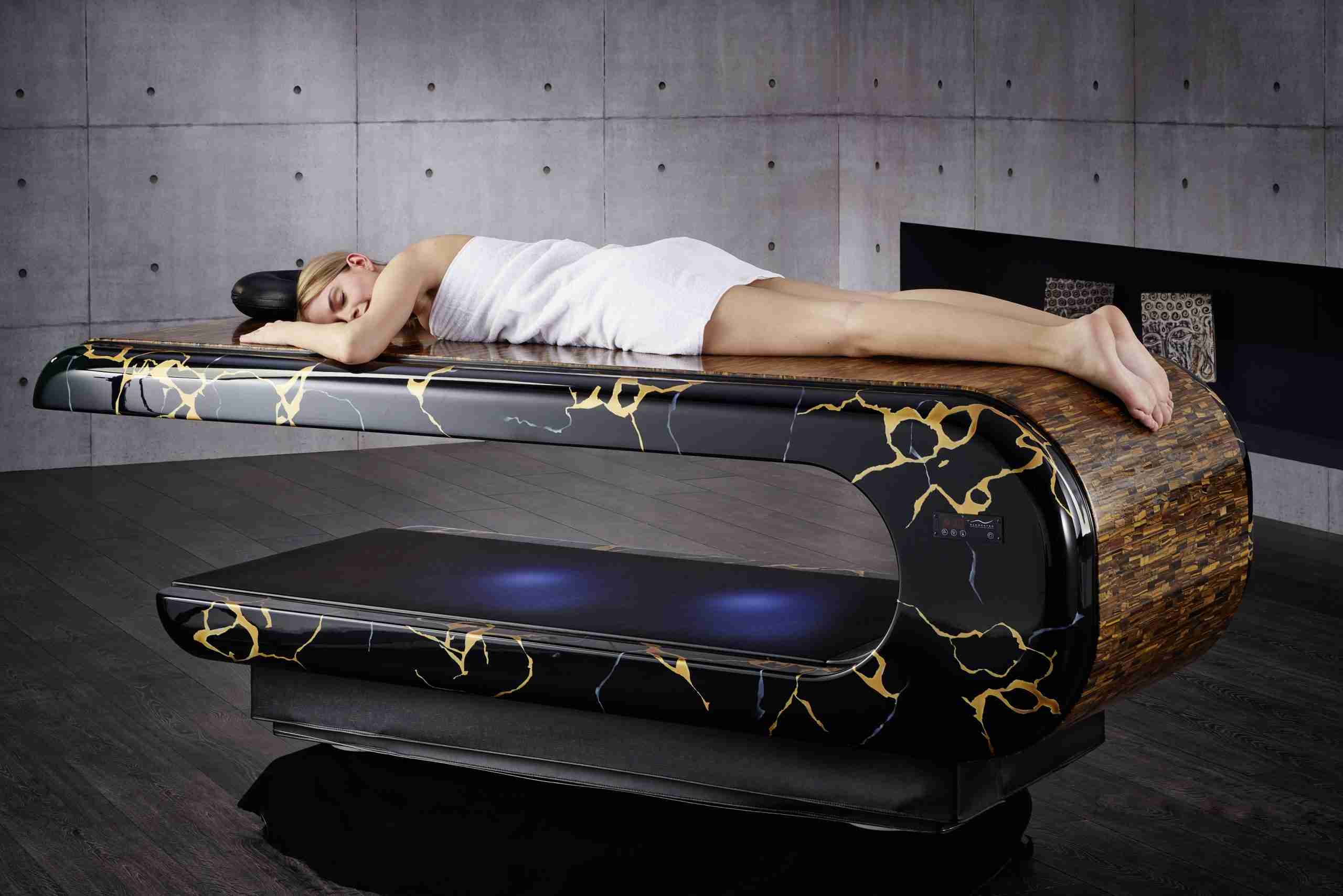 Cleopatra Heated Lounger — Cinematic Ambience With Softly Lit Spa Setting.