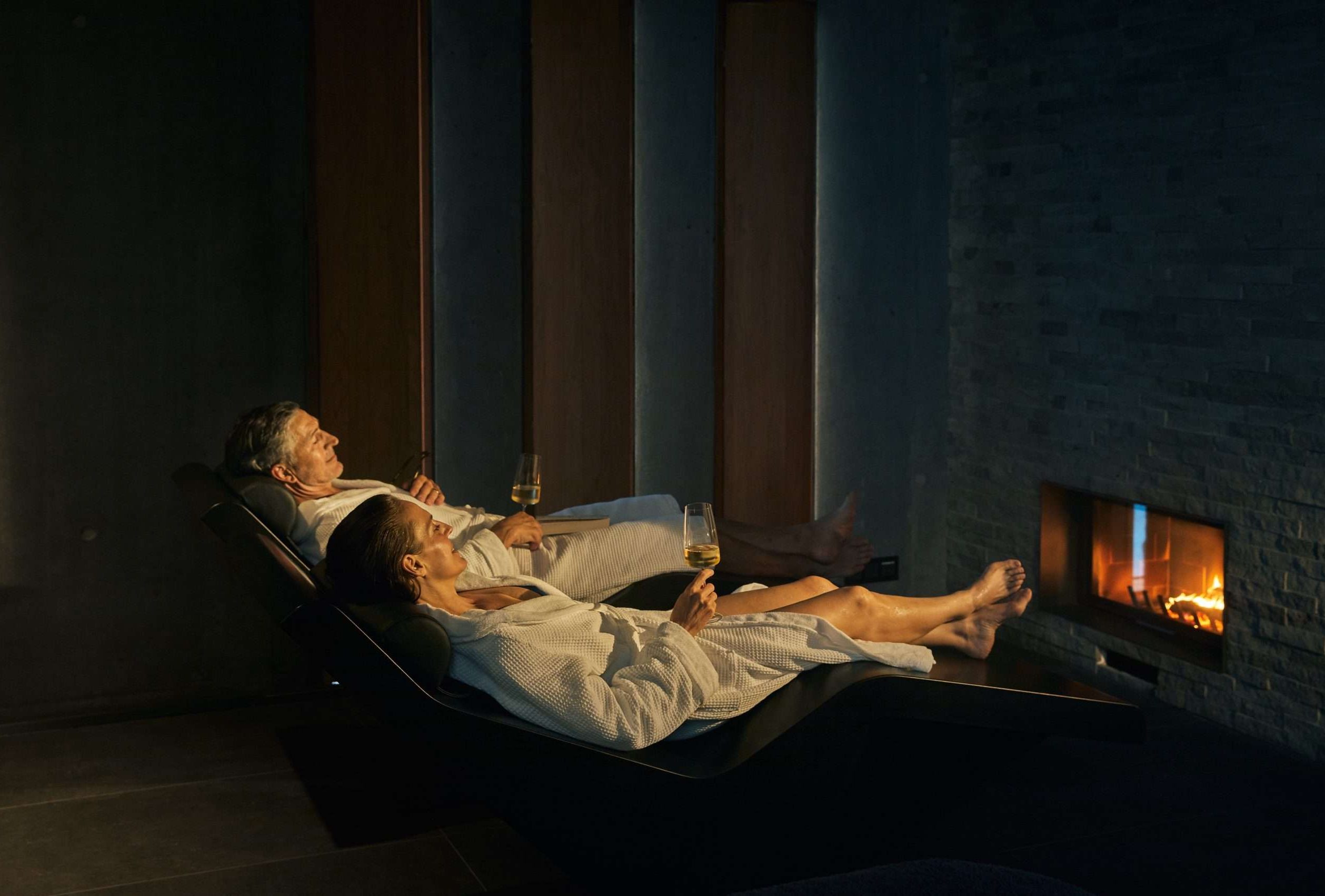 Heated Marble Loungers Overlooking The Blue Lagoon Spa Landscape In Iceland.