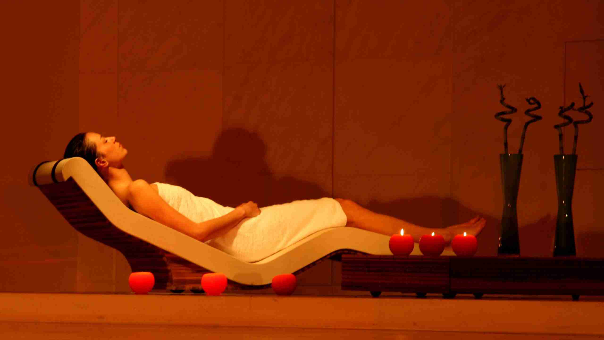 Luxury Spa Furniture Featuring A Cleopatra Basico Infrared Heated Marble Lounger Designed For Relaxation