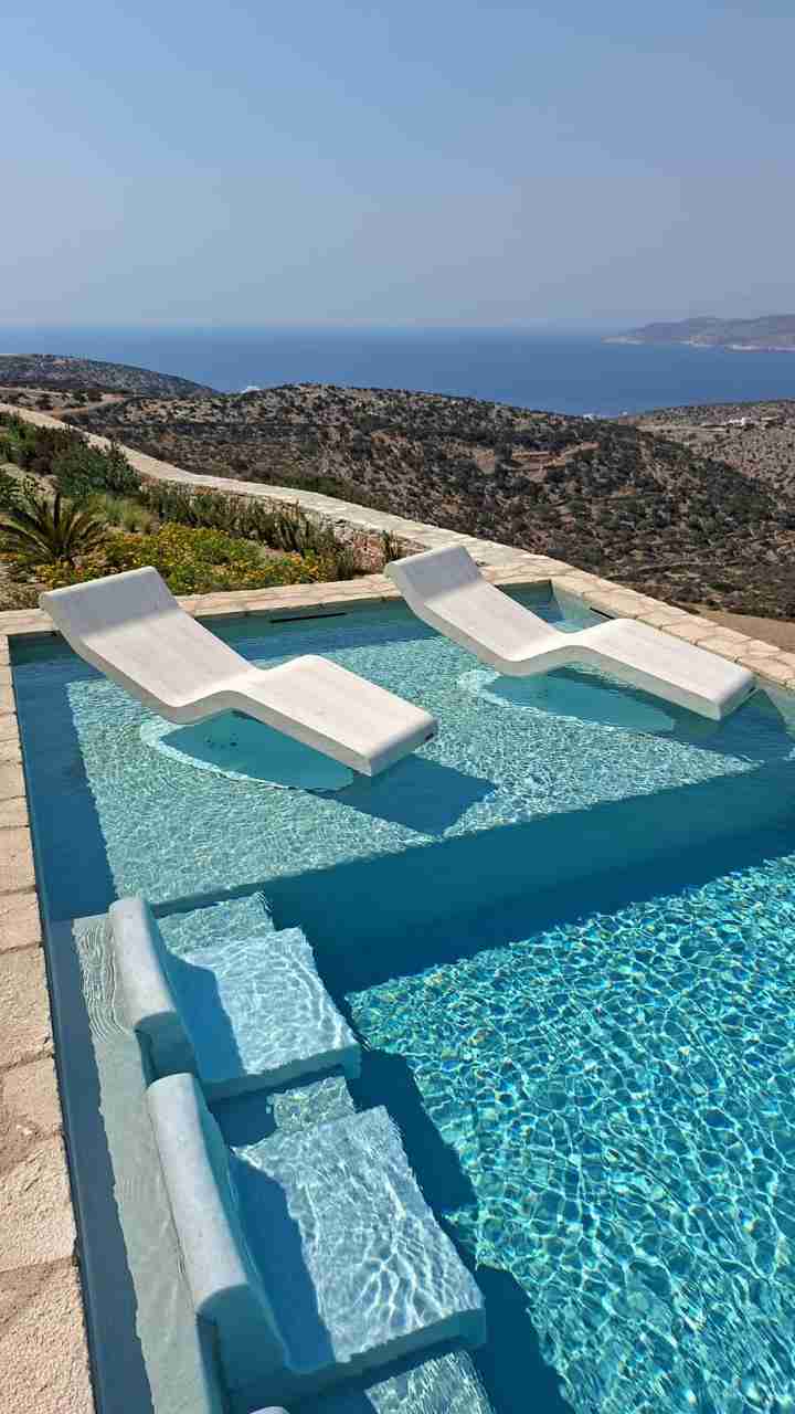 Cleopatra Pool-Base Heated Marble Loungers — Private Pool In Greece With Minimalist Architecture And Enveloping Radiant Heat.