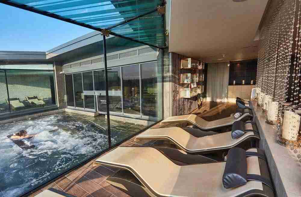 Diva Moderno Heated Marble Loungers — Hale Country Club Poolside Walkway With Refined Spa Aesthetics And Calming Heat.