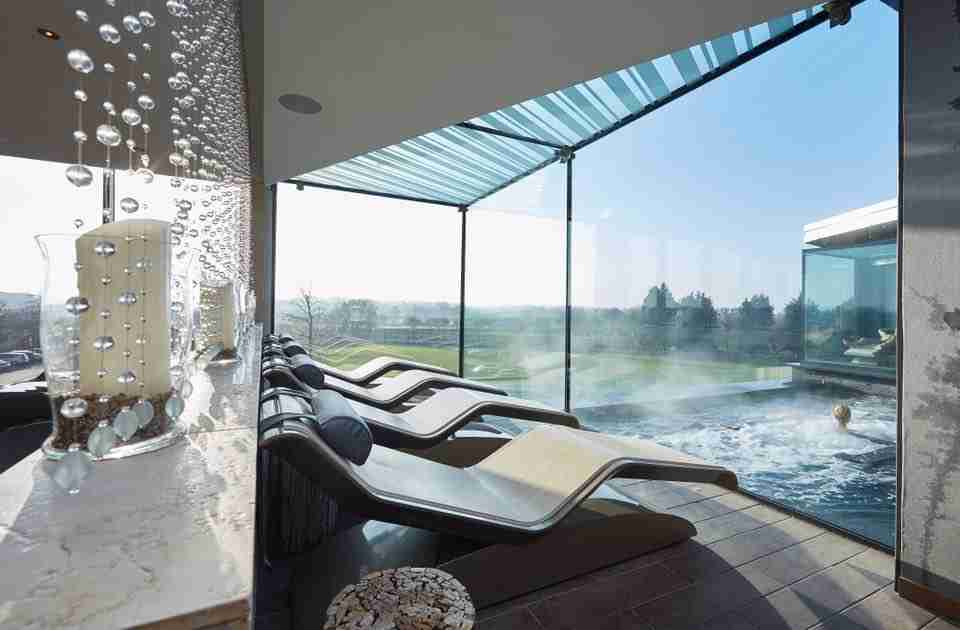 Spa And Wellness Space With Pool View Featuring A Diva Moderno Infrared Heated Lounger At Hale Country Club
