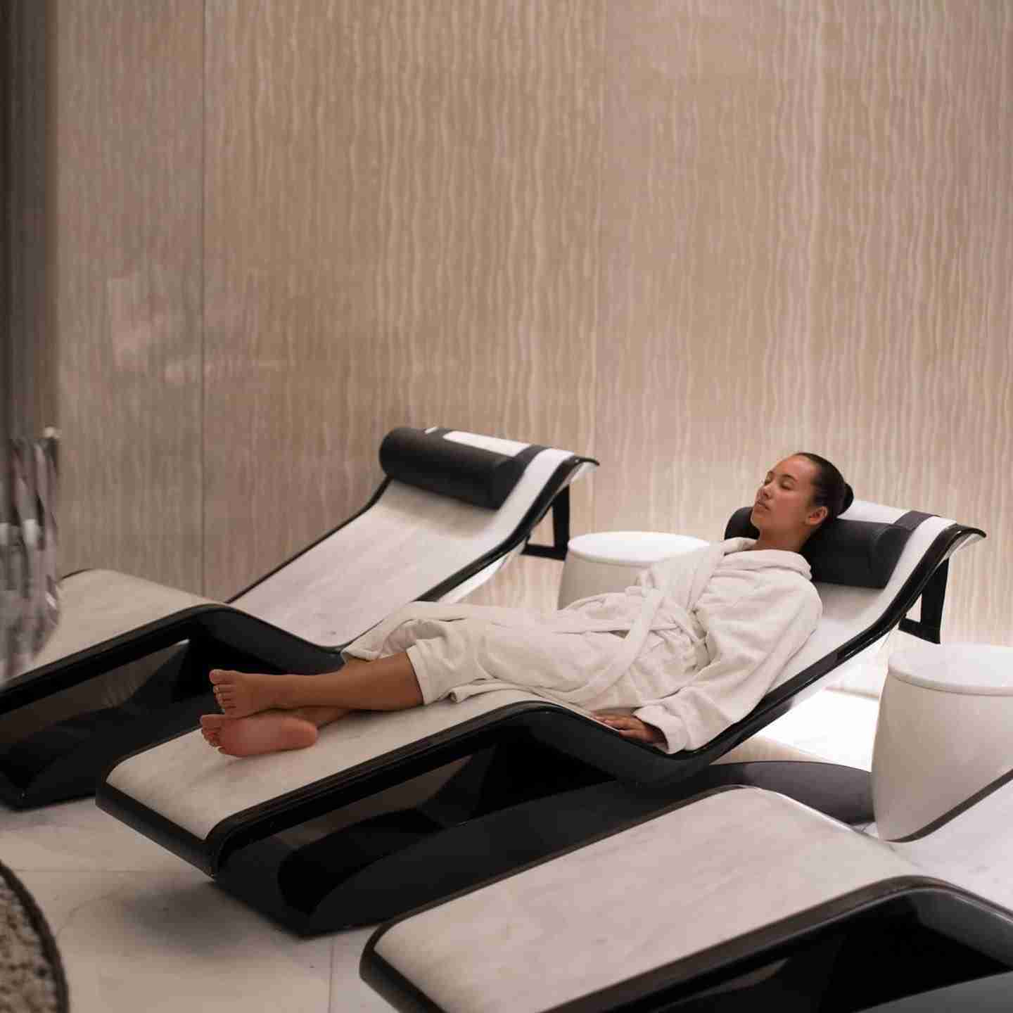 Diva Moderno Heated Marble Loungers — Wellness Retreat At Espa Life With Elegant Lighting And Comfortable Warmth.