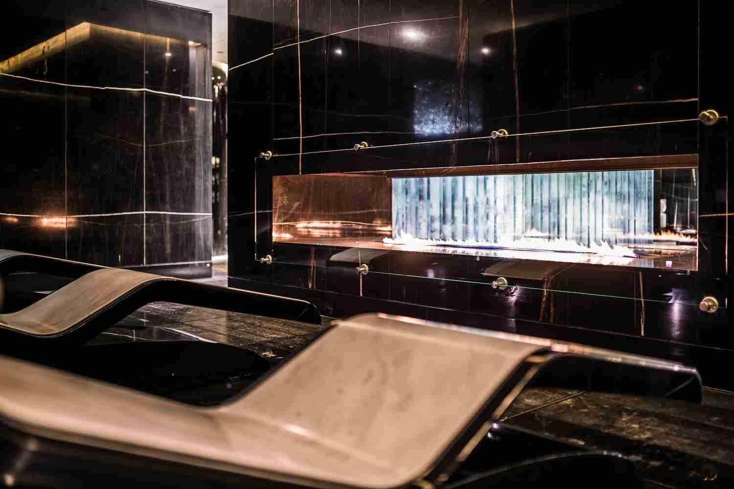 Loungers For Spa Relaxation: Heated Marble Loungers Installed At Espa Life At Corinthia As Luxury Spa Furniture For Wellness Areas