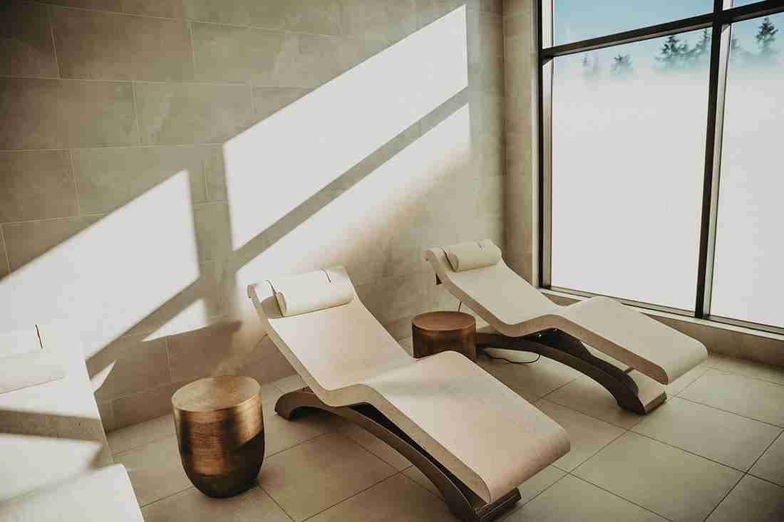 Heated Marble Loungers At Pro Club Seattle Wellness And Spa Area.