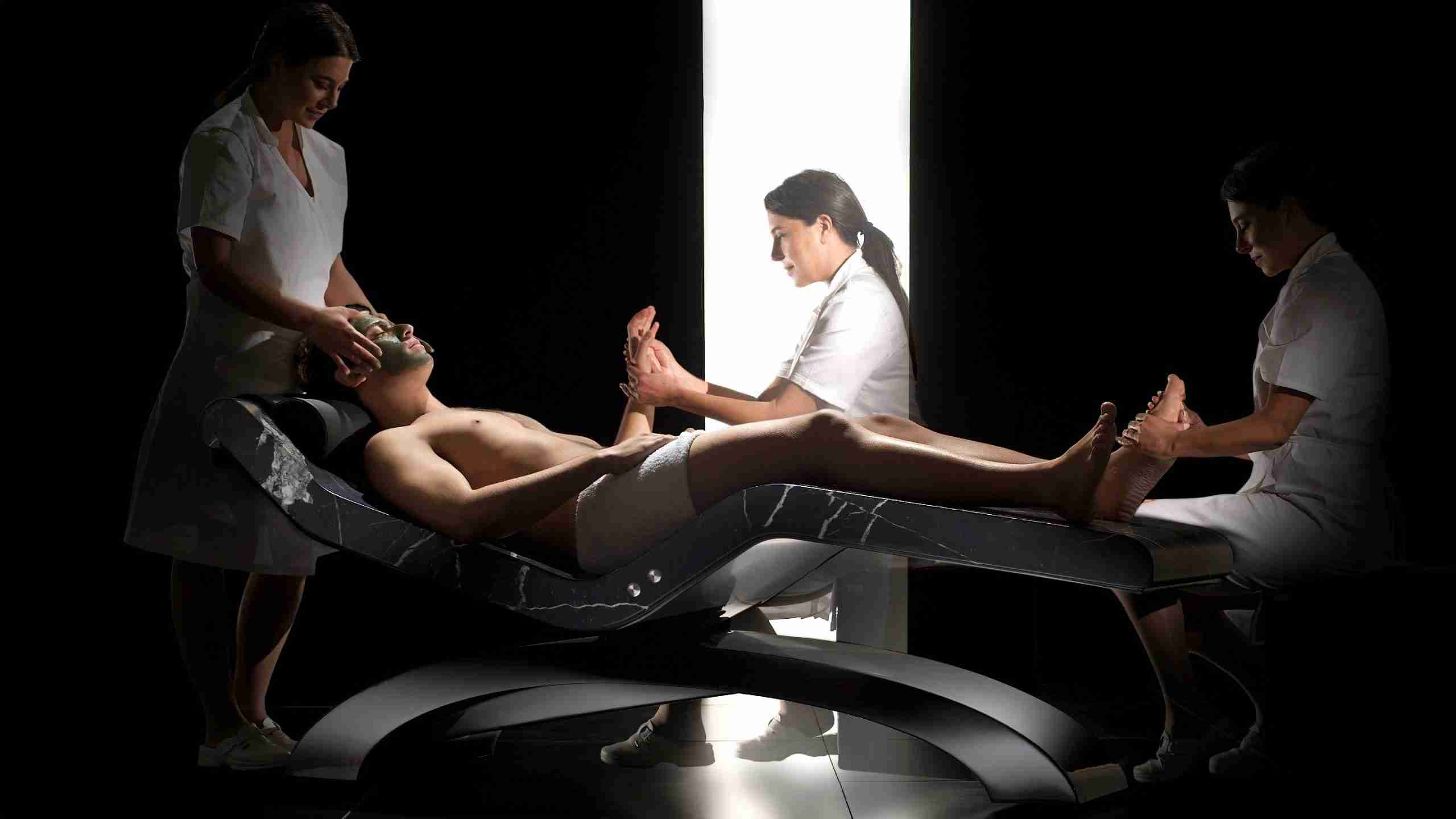 Architectural Wellness Furniture In A Treatment Room Featuring Cleopatra Classico Noire Heated Loungers For Interior Design Projects