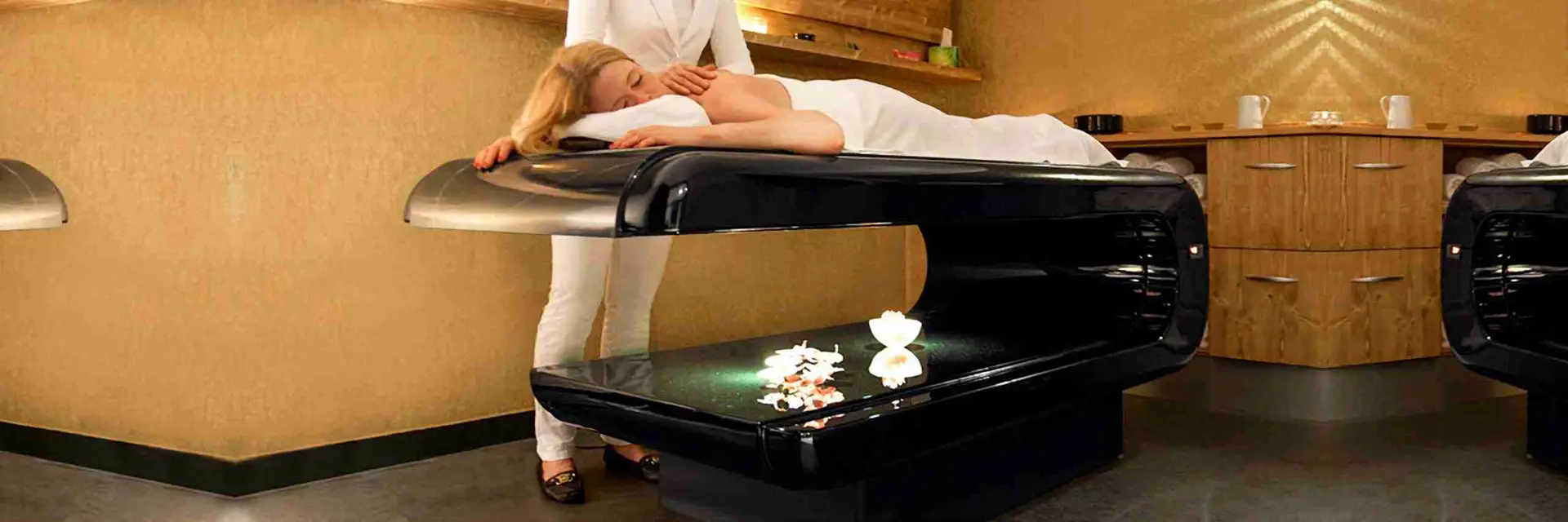 Square Table heated stone table — Germany spa retreat installation with elegant finishes and warm stone comfort.