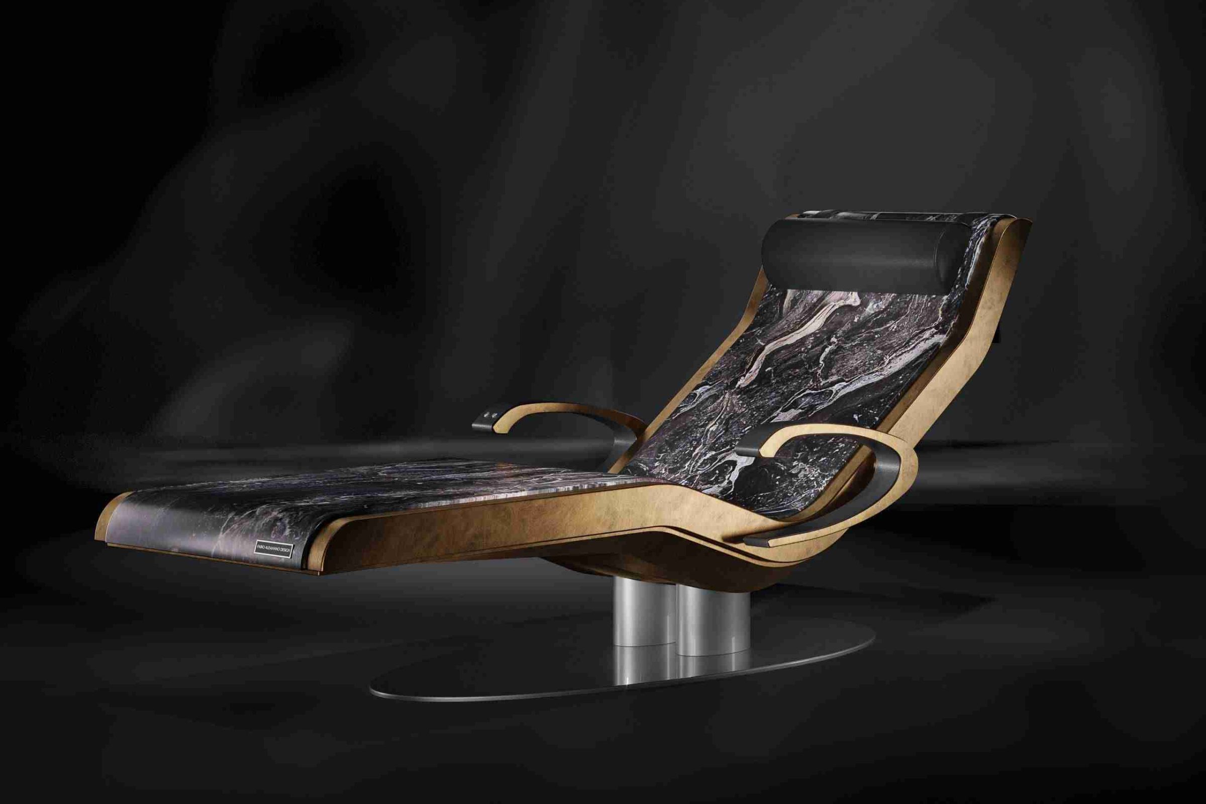 Front angle of a caesar heated lounger in Nero Marquina with armrests extended, designed for comfort and style.
