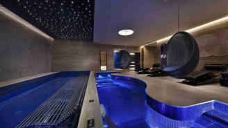 Luxury Diva heated marble loungers in ESPA Life Doha Spa relaxation area with pool and starry ceiling